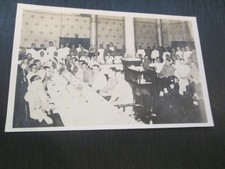 Postcard - Group of men at tables, possibly military, dinner (Unposted vintage)