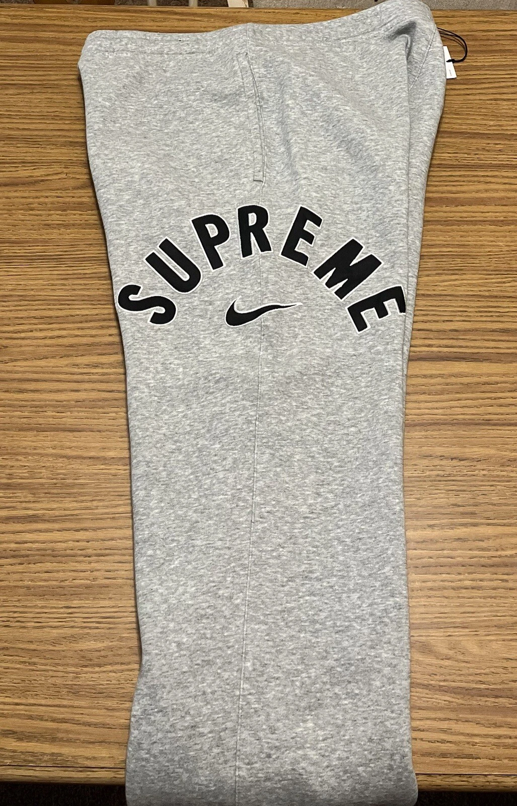 Pantalon de survêtement Supreme Nike Arc gris bruyère homme taille L *neuf*