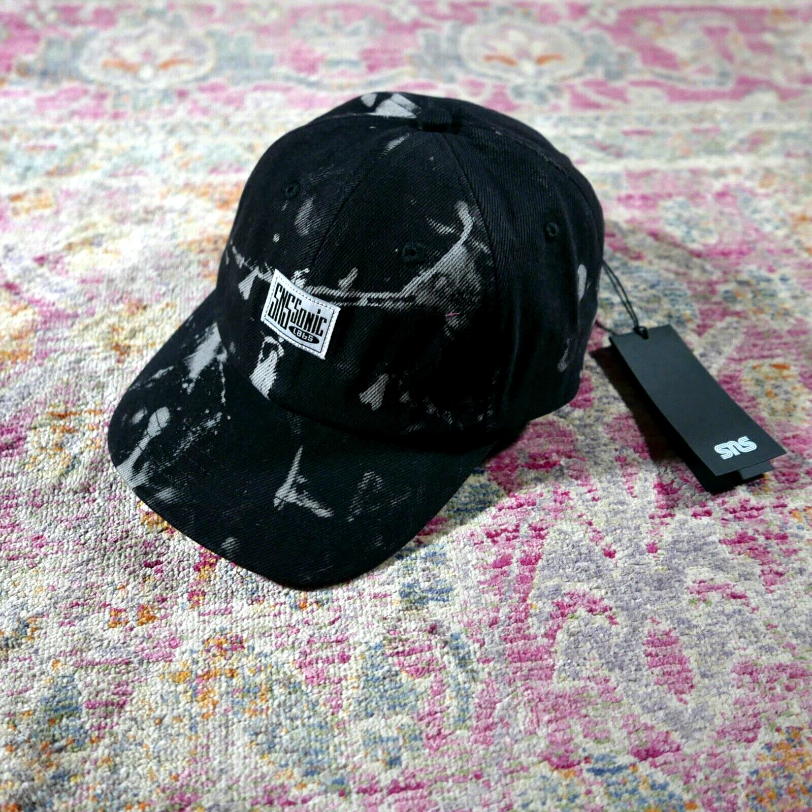 Casquette SNS blanchie 6 panneaux noire PRIX CONSEILLÉ Patta Consortium Union invaincue suprême