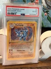 1999 POKEMON BASE SET 1ST EDITION #8 MACHAMP-HOLO PSA 4