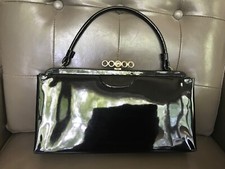 Vintage Bobbie Jerome 50  s black patent leather handbag finished with brass lock