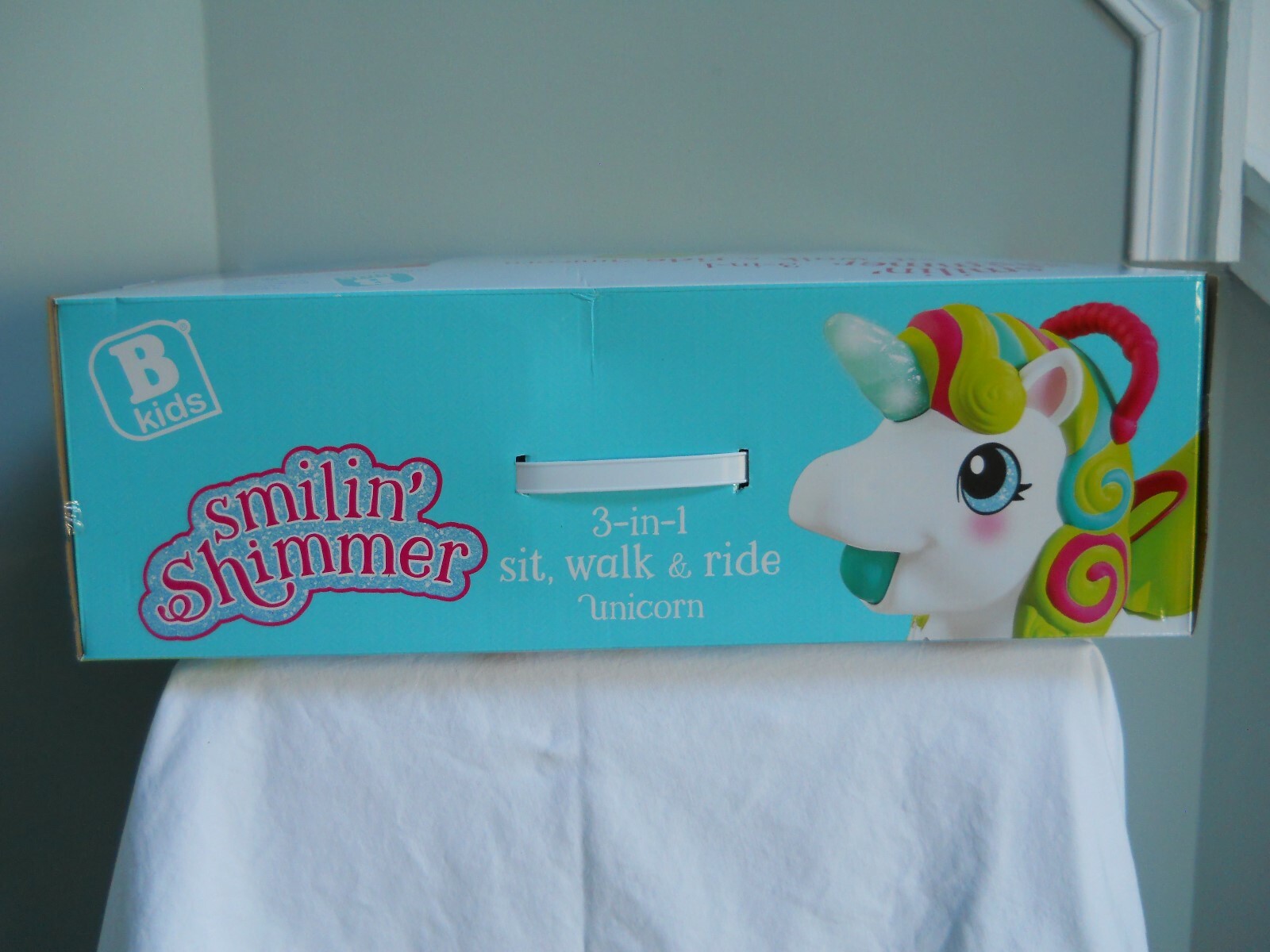 smilin shimmer 3 in 1 sit walk and ride unicorn