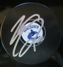 ERIK GUDBRANSON SIGNED VANCOUVER CANUCKS HOCKEY PUCK w/ COA
