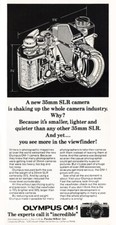 1975 Olympus OM1: Shaking Up the Whole Camera Industry Vintage Print Ad