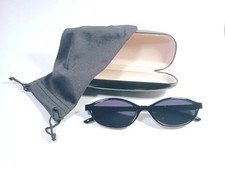Lady's Oval Cat's Eye Sunglasses With High Gloss Black Frame And Black Lenses.