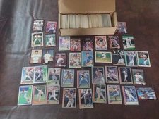 Box of baseball cards from 1992 and 1993. Different brands are represented.