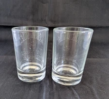 Jack Daniels Tennessee Fire Shot Glasses Set of 2 Embossed  2 1/2 "  Tall   5563