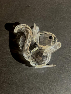 SWAROVSKI SQUIRREL FIGURINE HOLDING A NUT - LOGO ON THE BOTTOM -- CUTE!