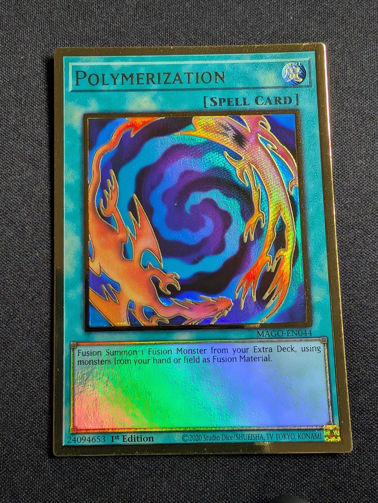 Yugioh - Polymerization MAGO-EN044 1st Premium Gold Rare NM