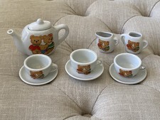 Miniature ceramic/porcelain child's tea set featuring a teddy bear pattern