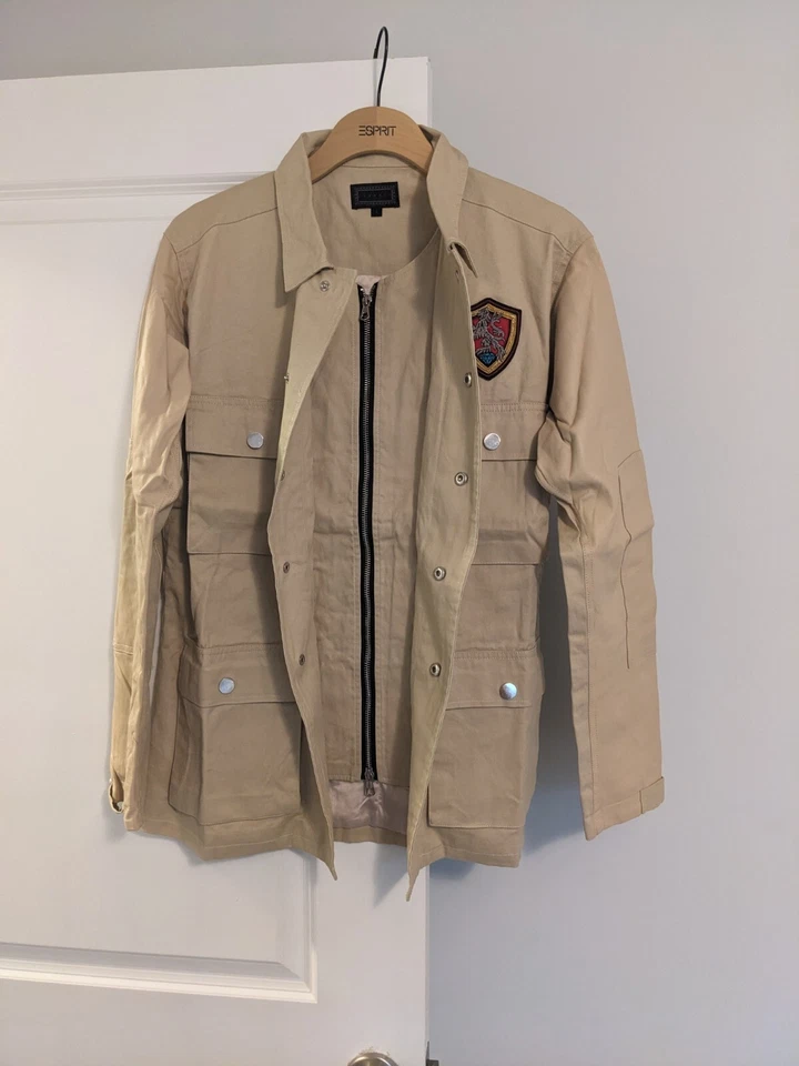 Diamond X Cordova - Chaqueta Tostada con Botones/Cremalleras con Mangas de Cuero Precio de venta sugerido por el fabricante $800 Talla Pequeña Foto 2 de 4