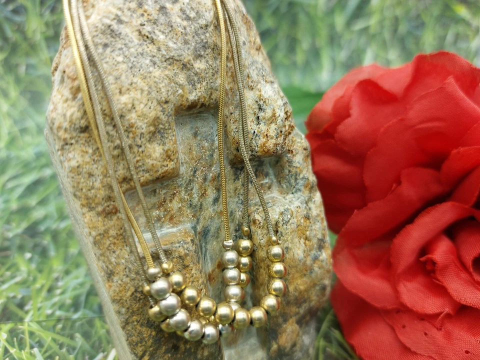 Pulseira Napier assinada tom dourado e prata bolas estacionárias correntes triplas 7" - Imagem 3 de 4