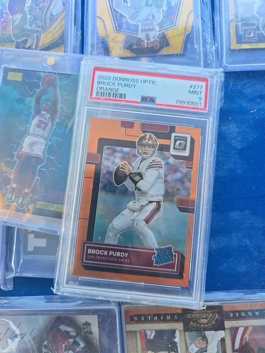 2022 Optic - Rated Rookie Brock Purdy #277  Orange Prizm 199/199(RC) Bookend