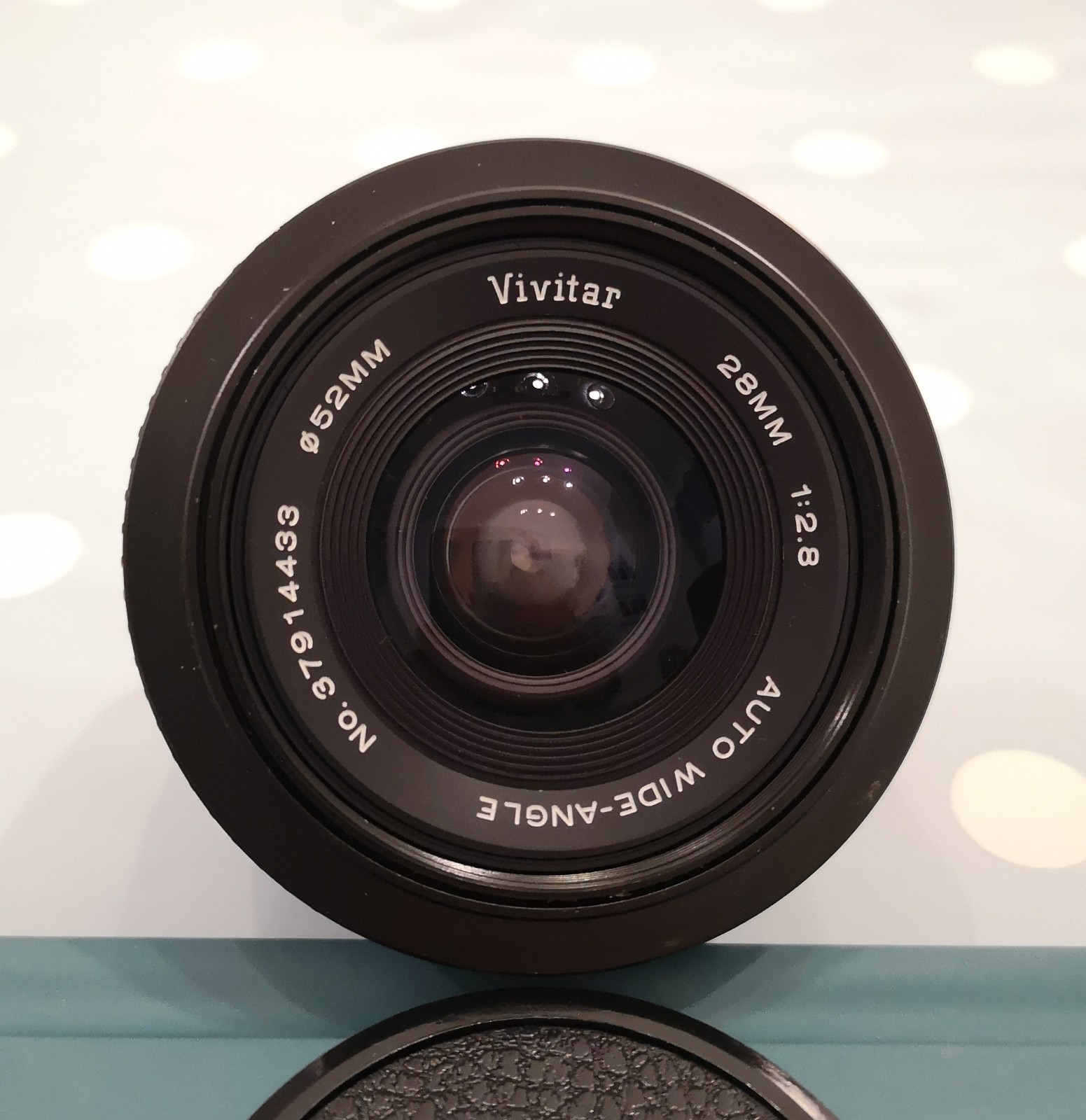 Vivitar 28mm f/2.8 Auto Wide Angle Lens. Interchangeable mount.
