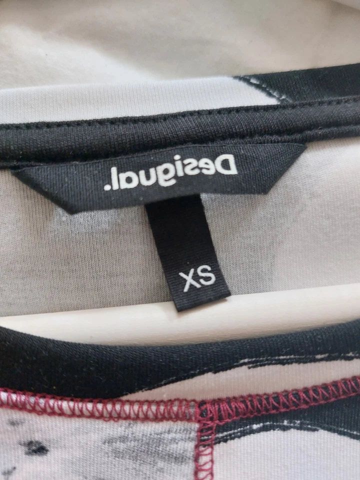 Abito Desigual bianco e nero con tessuto asimmetrico Tg XS - Immagine 3 di 3