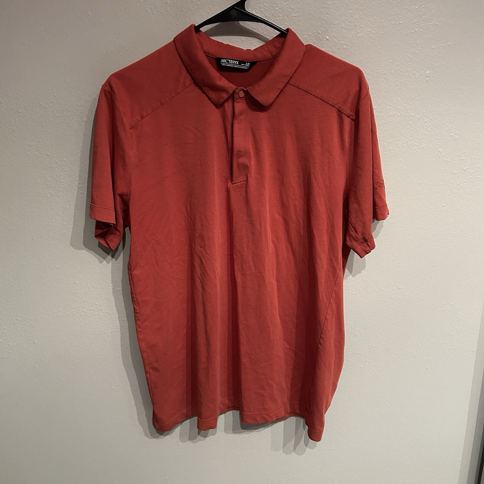 ARC'TERYX Polo uomo Arcteryx grande con bottoni a pressione arancione manica corta