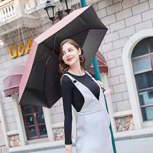 Mini parapluie pliable compact avec étui capsule UPF 50+ convient protection soleil pluie - Photo 11/17