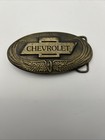 Vintage Chevrolet Racing Emblem Brass Belt Buckle With Flying Wing Wheel OVAL 