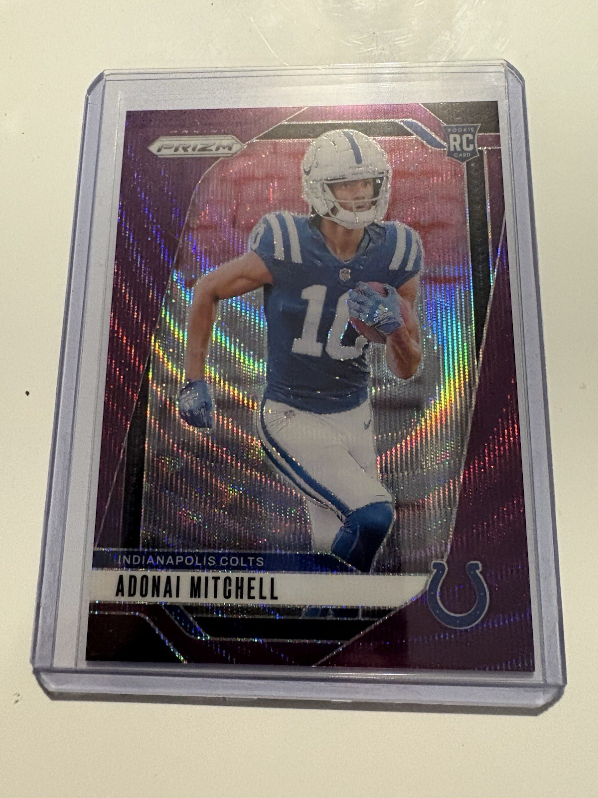 2024 Panini Prizm - Rookies Adonai Mitchell #303 Purple Wave Prizm /99 (RC)