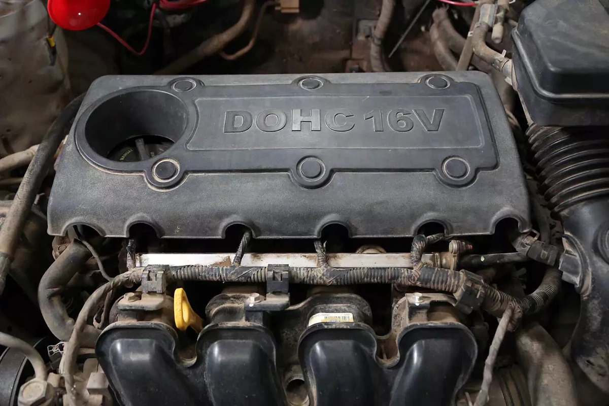 The plastic valve cover reinstalled.