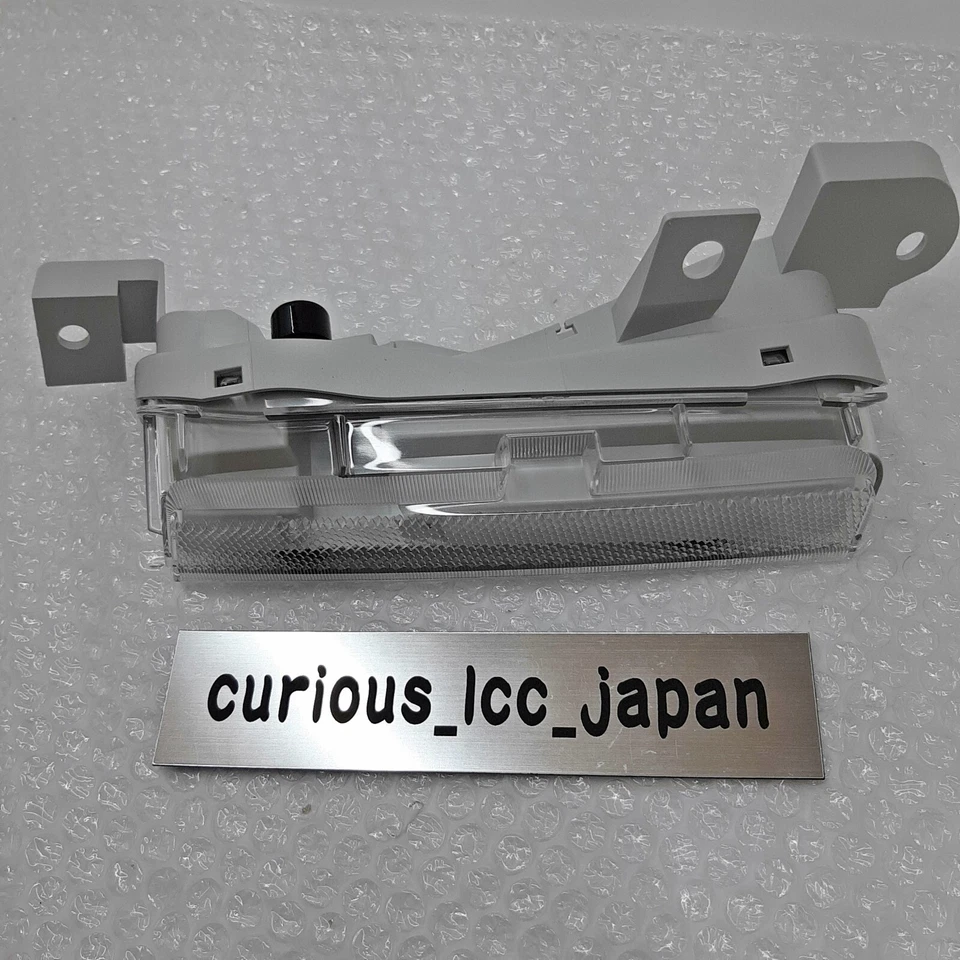 Reflector de parachoques trasero transparente izquierdo derecho Nissan OEM R35 GT-R 08-16 y Foto 4 de 4