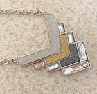 VINTAGE SIGNED GUESS SILVERTONE & GOLDTONE V SHAPED NECKLACE — photo 1