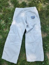 90's vintage khaki jnco jeans 36x30 with a wear wolf patch