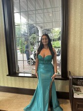 Teal prom dress from Estelle’s Dressy Dresses. Size 6 worn once (corset top)