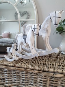 white wooden rocking horse