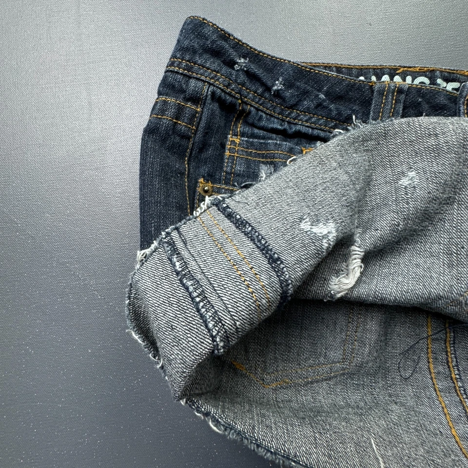 Falda vaquera Hang Ten para niñas talla 7 envejecida con tachuelas dobladillo crudo lavado oscuro Foto 4 de 4