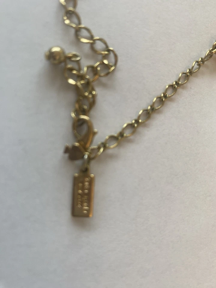 collar flor turquesa kate spade Foto 2 de 2