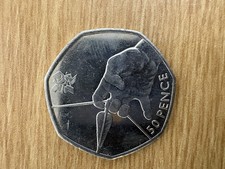 A 2011 United Kingdom 50 pence coin featuring an archery design Excellent Cond