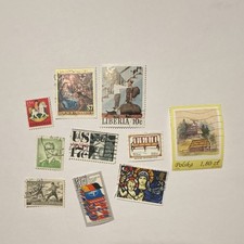 Worldwide Stamp Collection Austria Poland Liberia US 1999 Used Off Paper