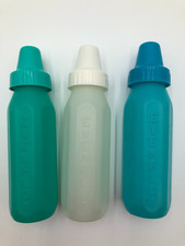 lot of 3 Vintage Evenflo Plastic Baby Bottles Green , White, Blue 8 oz.
