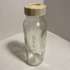 Evenflo Vintage Glass Baby Bottle 1950's to 1960's. Made In USA yellow top