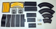 AURORA MODEL SLOT MOTORING TRACKS ACCESSORIES 50 PIECES LOT
