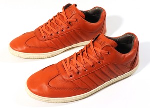 orange driving shoes