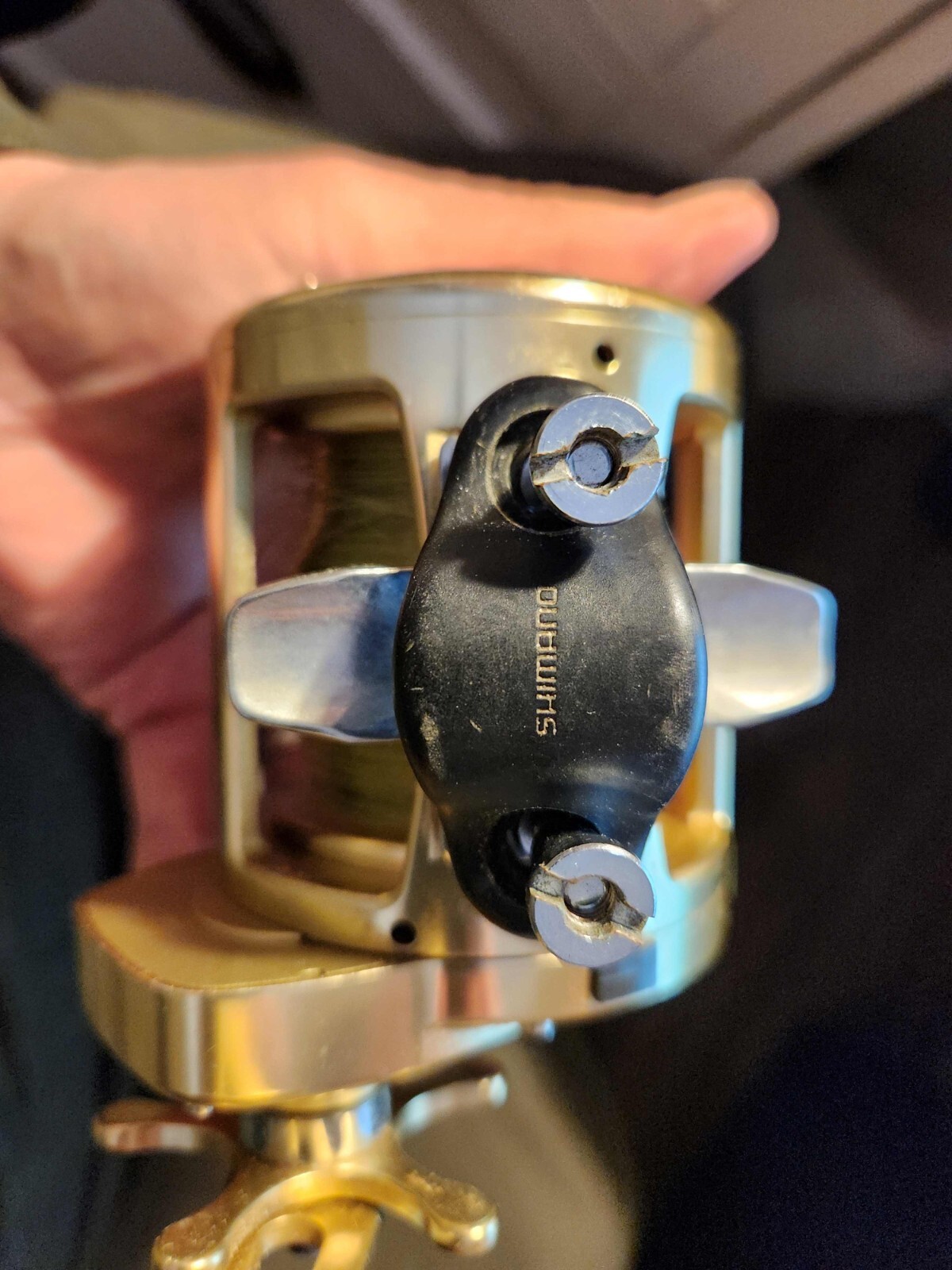 Trinadad 30 deep sea fishing reel, gold color with instructions and line