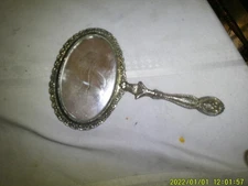 VINTAGE 2 SIDED OVAL HAND HELD MIRROR HEAVY WEIGHT MAYBE PEWTER