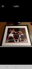 Muhammad Ali Punching Joe Frazier . Signed By Ali. Dual Authenticity