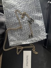 Chanel gold-tone chain belt with black enamel interlocking CC logos