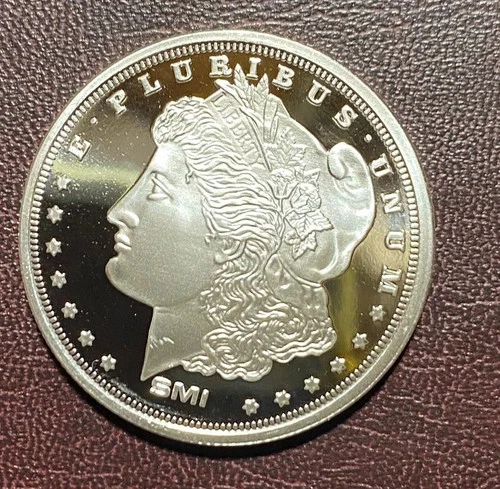 One-ounce silver round composed of .999 fine silver.