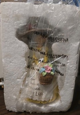 Sister'' ceramic girl figurine packed inside a custom-shaped protective Styrofoam