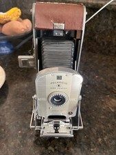 Polaroid land camera model 95 not sure if in working condition no film no flash