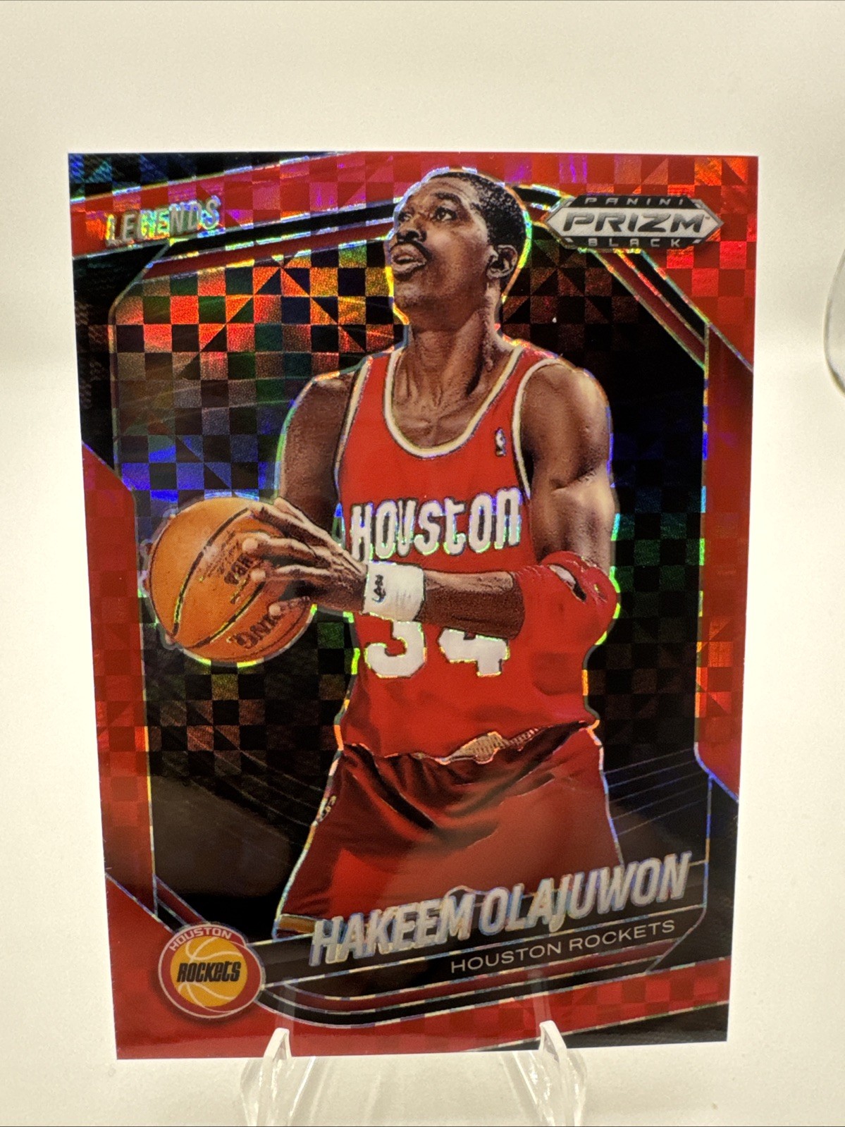 2024-25 Panini Prizm Black Legends Hakeem Olajuwon Red Power Prizm /75