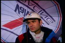 Gil de Ferran of Brazil watches the activity at the Budweiser GI J- Old Photo