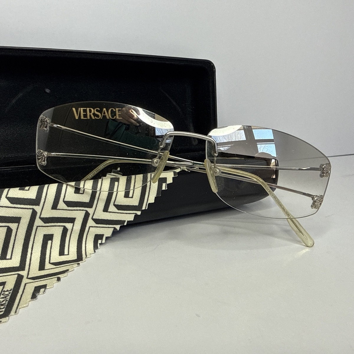 Vintage Versace Silver Medusa Rimless Sunglasses MOD. N87 Rare | eBay