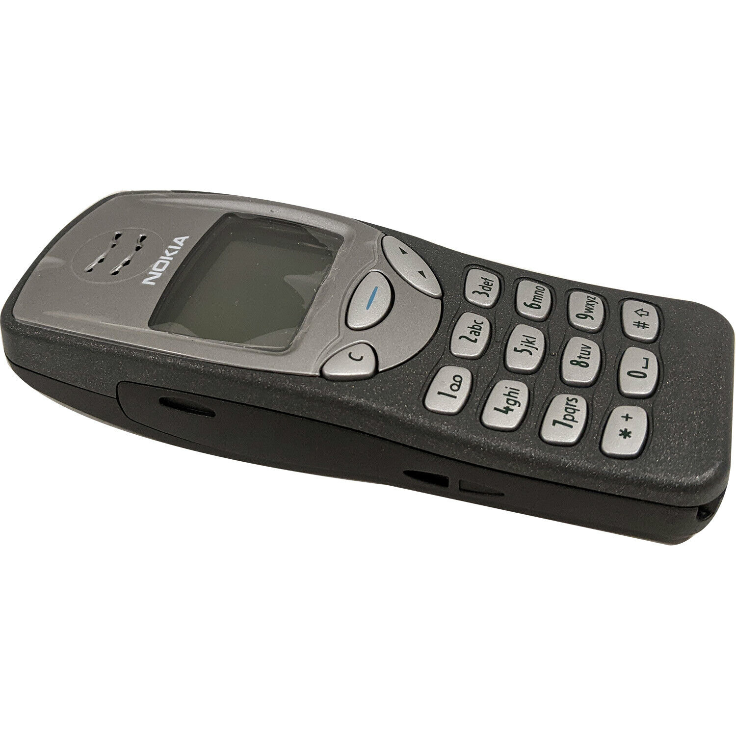 The legendary Nokia 3210, Nokia's very first mobile phone without an  external antenna. This one sports a more unusual, red housing instead of  the standard dark grey one. The original colored covers