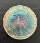 1995 Uncirculated American Silver Eagle Dollar - Rainbow Toned