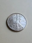 Proof like frosty 1 oz 2008 silver eagle slight gold tones